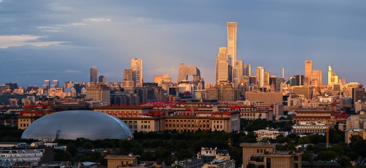 Photo taken on Oct. 3, 2022 shows the view of skyscrapers of the Central Business District (CBD) at dusk in Beijing, capital of China. (XinhuaWang Jianhua).jpg